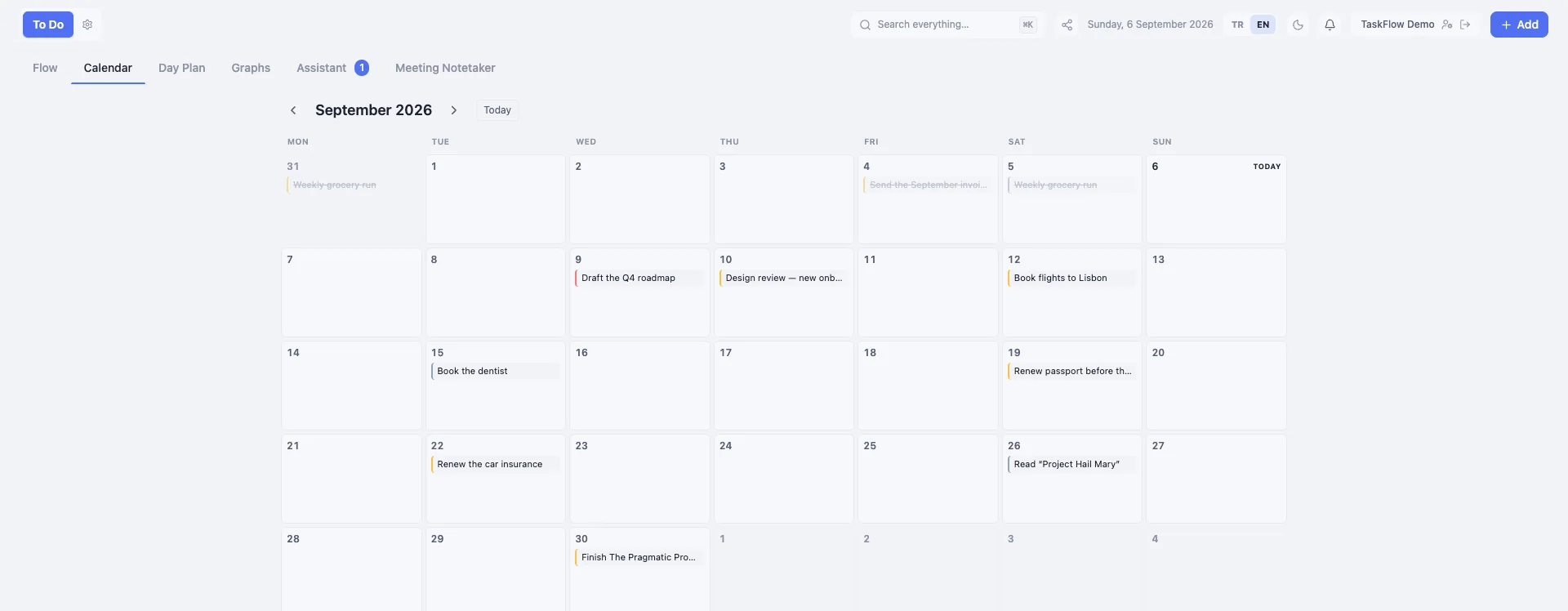 TaskFlow month calendar with tasks sitting on their due dates